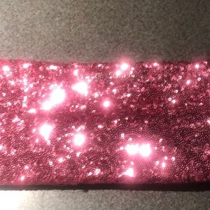 Victorian’s Secret pink sequin clutch or makeup bag